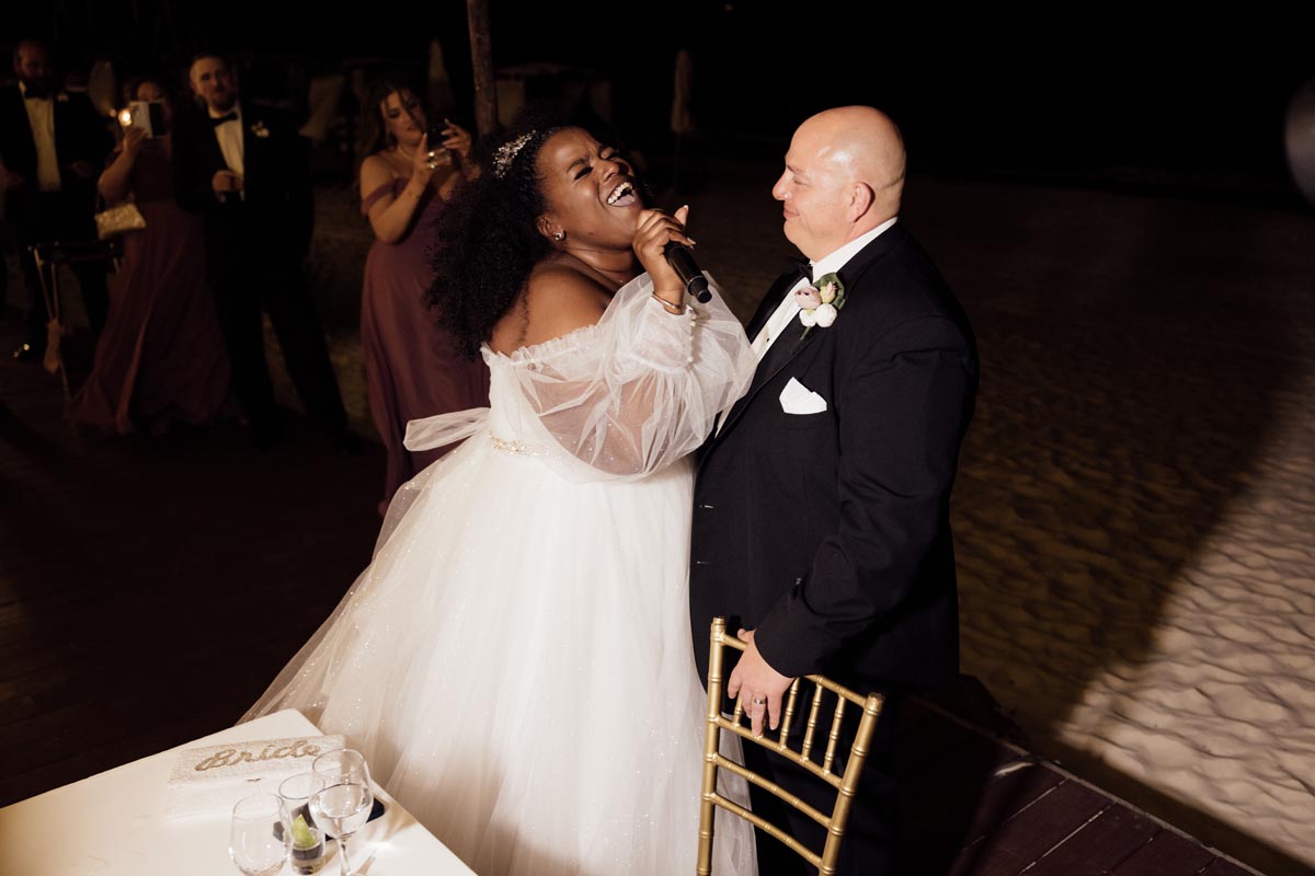 Bride serenades her new husband with a happy song