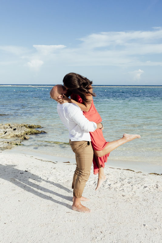 Honeymoon couple whirl on the tropical beach