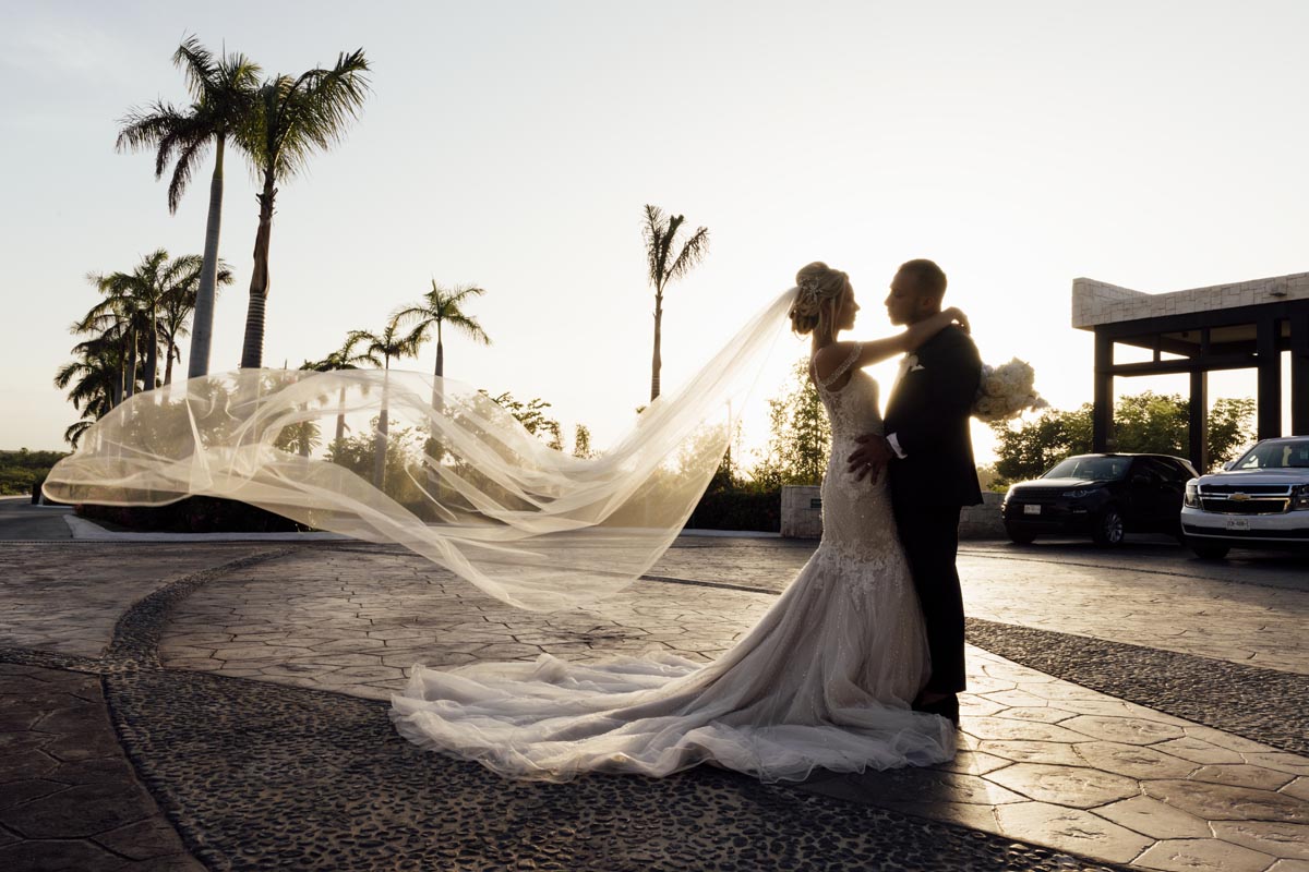 Newlyweds dance at sunset