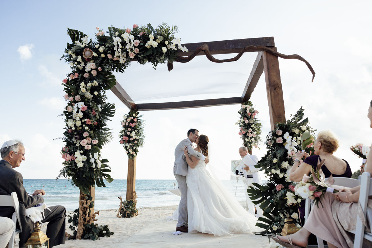 Newlyweds share first kiss after ceremony